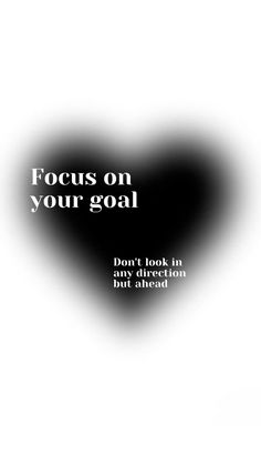 a black and white heart with the words focus on your goal