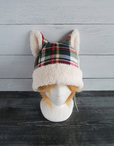 These Christmas Tartan Plaid Cat hats are made from fleece and sherpa. ⫸ Perfect for: fans, cold weather, costumes, or conventions. Very warm!⫸ Size: Fits anyone age 5+, one size fits most. Circumference about 24-25 in.⫸ Care instructions: I recommend hand wash cold. ⫸⫸ Black and Gray are Made when ordered.All hats are made in a smoke-free, pet-free environment. All hats are made with a sewing machine. Patterns and designs are drawn, cut, and made by me. ▎$1 shipping on this item and FREE shippi Weather Costumes, Cat Hats, Christmas Tartan, Fleece Hat, Cat Hat, Black And Gray, Tartan Plaid, Random Things, Sewing Machine