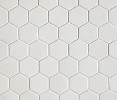 the white hexagonal tile is very clean and ready to be used as wallpaper