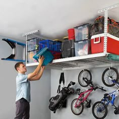 Step into the realm of organization and reclaim your garage space with the MonsterRax Overhead Garage Storage Rack, a 4 by 8-foot rack meticulously engineered to seamlessly blend into any garage setting, offering a symphony of functionality and style. This adjustable rack is crafted from the finest industrial-strength steel and fortified with a resilient powder coat finish ensuring durability and longevity. Featuring a rugged construction, this storage essential boasts a 500-pound weight capacit Garage Storage Organization Wall Shelves, Kids Bike Storage Garage, Kids Bike Storage, Garage Hanging Storage, Garage Storage Rack, Prefab Garages, Garage Ceiling Storage, Bike Storage Garage, Gear Room