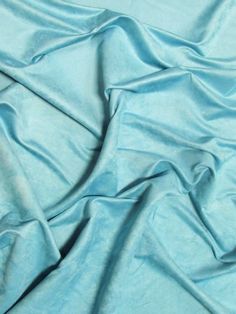 a blue sheet that is laying on the ground