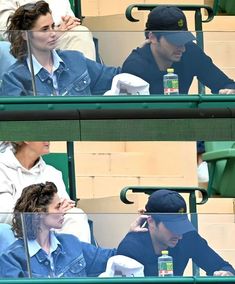 two people sitting next to each other at a tennis match