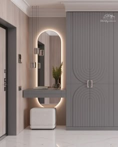 a bathroom with a vanity, mirror and lights on the wall next to an open door