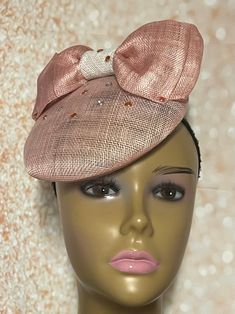 Light Pink Sinamay Fascinator Half Hat for Church head covering, Tea Party, Wedding, and other Special Occasions  Accented with double sinamay bows and rhinestones. The hat is affixed to the head via a hat string. 7 inches in diameter  Handmade Gifts for mom, sister, wife, or yourself. SHIPPING  All items for free shipping will be shipped via USPS FIRST CLASS MAIL. Adjustable Mini Hats With Bow For Kentucky Derby, Adjustable Fascinator With Structured Crown For Party, Adjustable Headpieces For Kentucky Derby Events, Adjustable Mini Hats For Royal Ascot Party, Adjustable Royal Ascot Costume Hats For Party, Adjustable Top Hat For Kentucky Derby Party, Adjustable Evening Hat With Bow, Brimmed Party Costume Hats And Headpieces, Elegant Headband Fascinator, One Size Fits Most