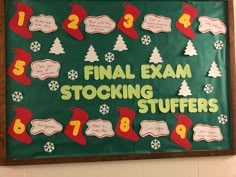 a green christmas stocking bulletin board hanging on the wall