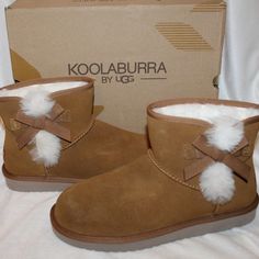 Finished With A Bow On The Side, The Victoria Mini Boots From Koolaburra By Ugg Will Keep Your Feet Warm During Cool-Weather Outings. Product Details Slip-On Round Toe ` Imported Product Specifications 5 In Shaft Height, 13.25 In Calf Circumference Medium Width Material & Care Upper: Suede; Midsole: Molded Eva; Lining: Fur; Outsole: Eva New In Box Guaranteed Authentic Fur Uggs, Purple Rain Boots, Waterproof Uggs, Sorel Snow Boots, Mini Boots, Short Rain Boots, Kids Rain Boots, Girls Snow Boots, Ugg Mini