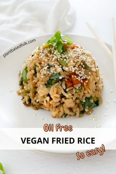 a plate of vegan oil free fried rice with chopsticks on the side with text "oil free vegan fried rice so easy!"