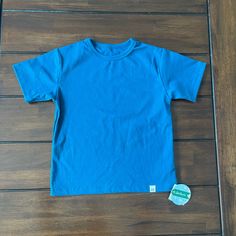 Unisex. Teal Blue Color. Nwt! Smoke And Pet Free Home. Blue Cotton Tops For Playwear, Blue Short Sleeve Tops For Playwear, Casual Solid Tops For Playtime, Solid Cotton Tops For Playwear, Basic Blue Short Sleeve Shirt, Basic Blue Plain Tops, Short Sleeve Shirt For Playtime, Basic Short Sleeve Tops For Playwear, Blue Plain Short Sleeve Shirt