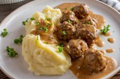 meatballs, mashed potatoes and gravy on a plate