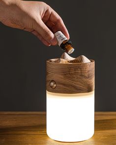 Inspired by the simplicity of travel and nature, the Nomad Lantern Lamp offers a portable yet stylish lighting solution. Its warm wooden top and handle evoke a sense of rustic charm, while the frosted base provides a soft, ambient glow perfect for any space. If you have any questions about our products, please get in touch with us and we will reply to you within 24 hours. Product Size With hand strap Model A Size: Dia 10cm x H 16cm / ∅ 3.9″ x H 6.3″ Without hand strap Model B Size: Dia 10cm x H 16cm / ∅ 3.9″ x H 6.3″ Details Material: Metal, Wood, Acrylic. Light source: Integrated LED. Kelvin range: Warm Light (3000K), Neutral Light (4000K), Cool Light (6000K). Power: ~3W Voltage: AC 110-240V. Moisture resistance: IP 20 Damp-rated not waterproof, for indoor use only. Environment: Indoor. B Lantern Table, Crystal Chandelier Kitchen, Lantern Table Lamp, Hallway Wall Lights, Portable Lighting, Tiffany Style Table Lamps, Chandelier Art, Kitchen Island Chandelier, Recessed Wall Lights