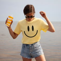 You will love this vintage happy face tshirt! These smiley tees are so soft and comfortable so they're great for lounging at home or running around doing errands! These retro smile face shirts make great gifts for your bestie, daughter, sister or anyone who loves giving off happy, positive vibes! These t-shirts are not made as an oversized fit so please make sure to check the size chart and order up a few sizes if you are looking for that baggier fit! *PRODUCT DESCRIPTION* -Bella+Canvas 3001 Unisex Jersey Short Sleeve Tee -100% cotton (fiber content may vary for different colours) -Light fabric -Tear-away label -Shirt colour may vary slightly due to variations in lighting and monitor brightness *SIZING* -Retail fit (slightly fitted) -Runs true to size -See size guide in product photos for Smiley Face Tshirt Ideas, Smiley Face Shirts, Vintage Smiley Face, Aesthetic Smile, Yellow Tshirt, Smiley Face Tshirt, Label Shirt, Fiesta Shirt, Smiley Face Shirt