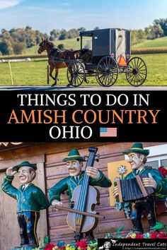 an amish country scene with two statues and a horse drawn carriage in the background