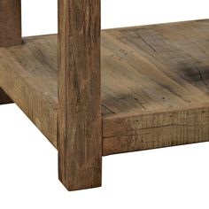 a close up of a wooden table with one leg missing from the top and another leg missing from the bottom