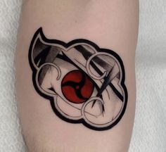 a tattoo on the leg of a man with scissors