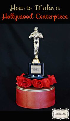 an award trophy sitting on top of a red box with roses around it and the words how to make a hollywood centerpiece