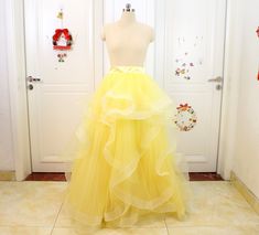 Yellow 4 Layer High Waist Tulle Skirt, Wedding Skirt,  Tulle princess Skirt, Birthday Party Skirt, Floor Length Tutu Skirt  DESCRIPTION  Dresses Length: Floor Length Waistline: Natural Material:Satin,tulle Silhouette: A-Line  CUSTOMIZATION  The dress can be made-to-order. Please note the following information in your order: Waist:  Hips:  Shoulder to shoulder Hollow to Floor(barefoot):  Height(barefoot): From head to floor) Shoes high： Date when you need the dress:   There is no extra charge for made-to-order dresses.  If you purchase stander size,Please refer to the size chart provided in listing photos,thank you.  The dress will be shipped from China,it will take 8-15 days to complete and 3-5 days to arrive.If you need it in hurry ,please contact me,I will do my best for you.  RETURN  In Tulle Skirt Wedding, Skirt Tulle, Wedding Skirt, Princess Skirt, Satin Tulle, Party Skirt, Shoes High, Tutu Skirt, Natural Material