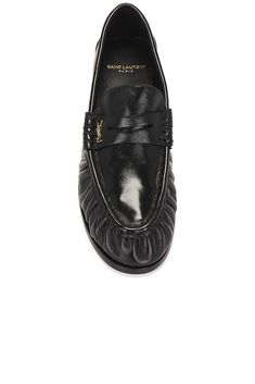 Find SAINT LAURENT Le Loafer Mocassin In Black on Editorialist. Saint Laurent Le Loafer Mocassin in Black Leather upper and sole. Made in Italy. Slip-on styling. Padded leather footbed. Gold-tone hardware at vamp. SLAU-WZ1203. 766876-AA00K-1000. About the designer: SAINT LAURENT has been influencing and revolutionizing the fashion industry since the debut of its iconic ‘Rive Gauche’ collection in 1966 - the couture house was the first to create a ready-to-wear capsule. The sleek, precisely tailo Anthony Vaccarello, Best Handbags, The Fashion Industry, Rive Gauche, Fashion Industry, Biker Jacket, Leather Loafers, Womens Flats, Flat Shoes Women