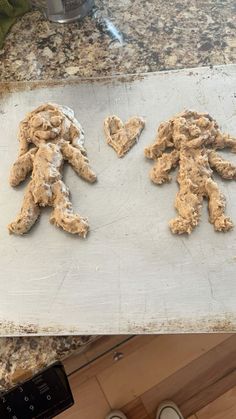 two pictures of cookies being made in the shape of teddy bears on a counter top