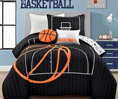 a bed room with a basketball comforter and pillows