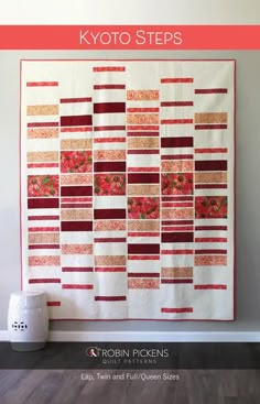 a red and white quilt hanging on the wall with text overlay that says, kyto steps