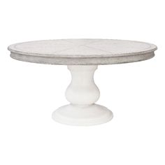 a white table with an oval top and two pedestals on the base, all made out of concrete