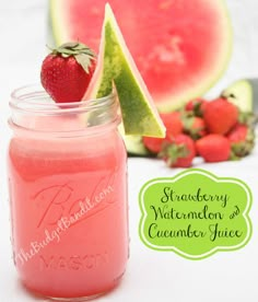 a strawberry watermelon and cucumber juice in a mason jar