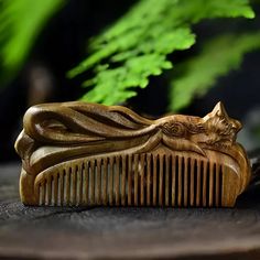 Elegance Meets Functionality: Green Sandalwood Hand-Carved Hair Comb Embrace the beauty of tradition and craftsmanship with this exquisite Green Sandalwood Hand-Carved Hair Comb. Designed to not only style your hair but also promote scalp health, this natural wood comb is delicately hand-carved with a beautiful fox motif, making it a unique and thoughtful gift for Valentine’s Day or any special occasion. Sandalwood is known for its calming properties, helping to reduce tension, headaches, and ev Vintage Hair Brush, Fox Valentine, Wood Comb, Wooden Comb, Reduce Tension, Gift For Valentine, Scalp Health, Hair Breakage, Vintage Hair