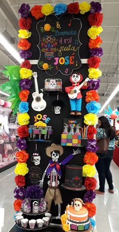 a display in a store filled with lots of colorful decorations and decor on the wall