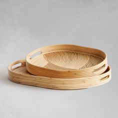 two round bamboo trays on top of each other