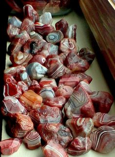 some red and white marbles are on the counter