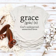 a t - shirt that says grace and the words god's underserved, unnerested flavor