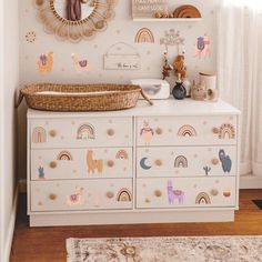 a white dresser topped with lots of drawers