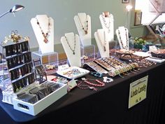 a table with jewelry on it at an event