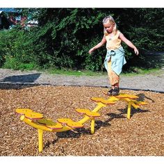 Practice balance and agility on Kidstuff Playsystems challenge walk. Frame is powder-coated, galvanized steel; steps are high-density, UV resistant and polyethylene. | Kidstuff Playsystems, Inc. Challenge Walk Metal, Size 96.0 W x 24.0 D in | Wayfair Outdoor Play Spaces, Commercial Playground Equipment, Kids Outdoor Play, Outdoor Classroom, Landscape Plan, Backyard Playground, Outdoor Movie, Kids Play Area, Backyard For Kids