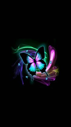 a colorful butterfly flying through the air with its wings spread out and glowing in the dark