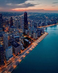 an aerial view of the chicago skyline at night