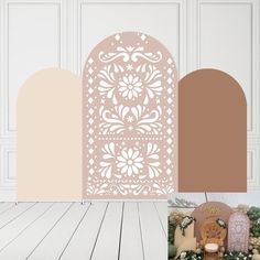 an assortment of decorative wall panels in various shapes and sizes, including one for the door