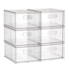 four clear drawers stacked on top of each other