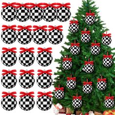 a christmas tree decorated with black and white checkered ornaments