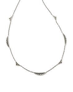 Wanting to add some unique dimension to your necklace stack? Look no further than the Sophee Strand Necklace in Oxidized Sterling Silver. Crafted in long-lasting metal, this strand features rounded and triangular ridges with a hoofprint design, a signature brand detail. Instantly eye-catching, this necklace will add a fun spin to your everyday layers. This necklace is a part of Yellow Rose by Kendra Scott—a brand that celebrates ranch life with Kendra Scott staples alongside select curated jewelry pieces and accessories. Metal Oxidized Sterling Silver Why Sterling Silver? Our Sterling Silver collection features elevated styles to wear time and time again. With a base of both pure silver and copper, Sterling Silver provides a precious yet affordable option that offers long-lasting wear and Layered Silver Necklaces, Silver Kendra Scott, Hoof Print, Necklace Stack, Layered Necklaces Silver, Stacked Necklaces, Silver Collection, Ranch Life, American Southwest