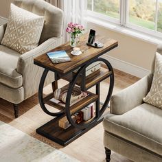 a living room with two chairs and a coffee table in the middle of the room