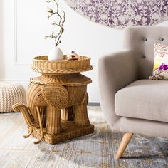 a living room with an elephant table and chair