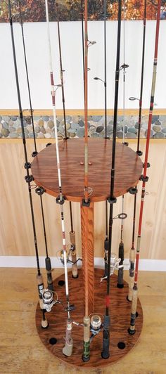 there are many different types of fishing rods on the table