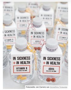 several bottles with labels on them are labeled in sickness and in health, as well as vitamins