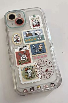 an iphone case with some stickers on it