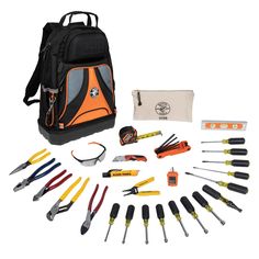 an orange and black backpack with many tools in it, including screwdrives, wrenches, pliers, etc