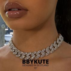 The 16mm Cuban Baguette Necklace is an upgraded version of the classy Cuban Link Necklace. Featuring both the round cut and the baguette-shaped prong-set stones. This is a statement piece that will do the talking for you. DESIGNED IN SCOTLAND BY BBYKUTE Luxury Classic Diamond Necklace With Curb Chain, Luxury Diamond Necklace With Baguette Cut Diamonds, Elegant Silver Iced Out Rhinestone Necklace, Luxury Diamond Necklace For Party, Trendy Silver Iced Out Jewelry, Silver Cuban Link Necklace For Party, Diamond Cuban Link Necklaces For Party, Diamond Cuban Link Necklace For Party, Party Cuban Link Cubic Zirconia Jewelry