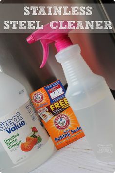 a bottle of stainless stainless steel cleaner next to a carton of cleaning products