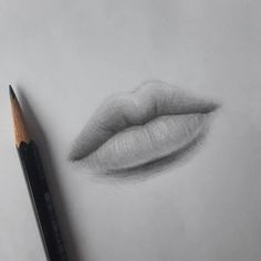 a pencil drawing of a woman's lips