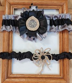 Fighting through the odds. This set contains one bridal garter and one toss garter. Band is gray satin with black center trim. Gray and black bow holds a twine wrapped helm of awe. Small black gems peek out of the bow. Elastic in the band makes this a one size fits most item. Bridal garter band measures 1.75" wide. Toss garter band measures .75" wise. Not seeing the color(s) you're looking for? Message me, I'd love to help! Names can also be added for an extra fee. Helm Of Awe, Wedding Garters, Black Gems, Bridal Garter, Garter Set, Black Bow, Black And Gray, Black And Grey, Music Clothes